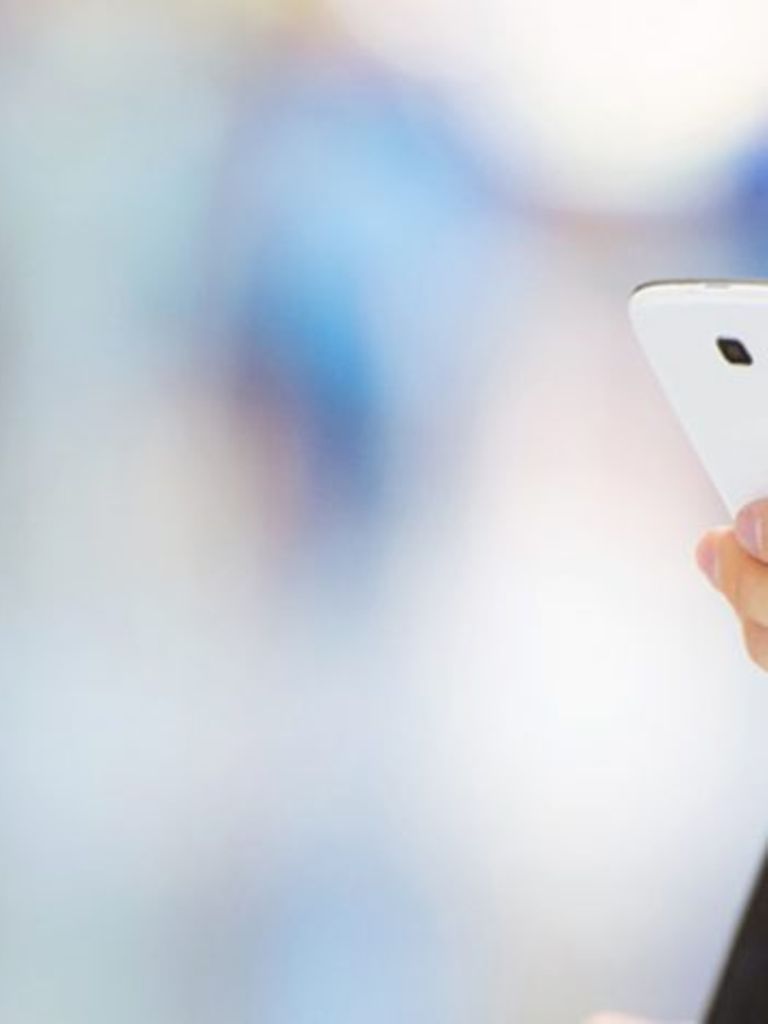 man holding a mobile phone